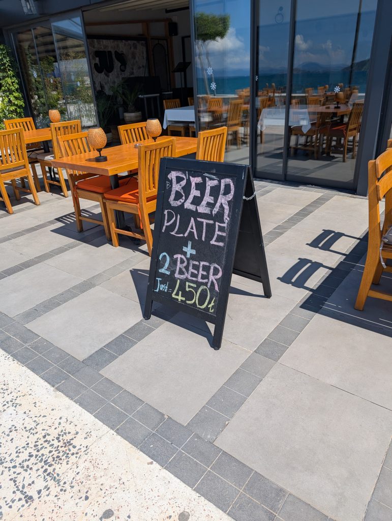 a blackboard sign saying Beer Plate & 2 Beer just 450tl - this was taken in Calis in Turkey which I found to be a very teen friendly destination