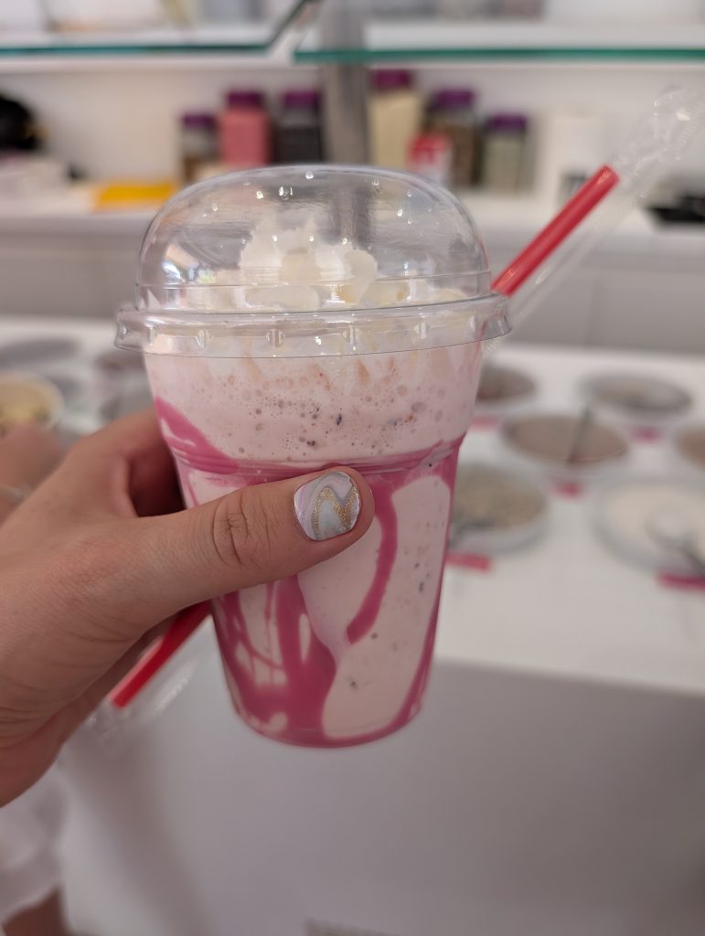 A pink milkshake
